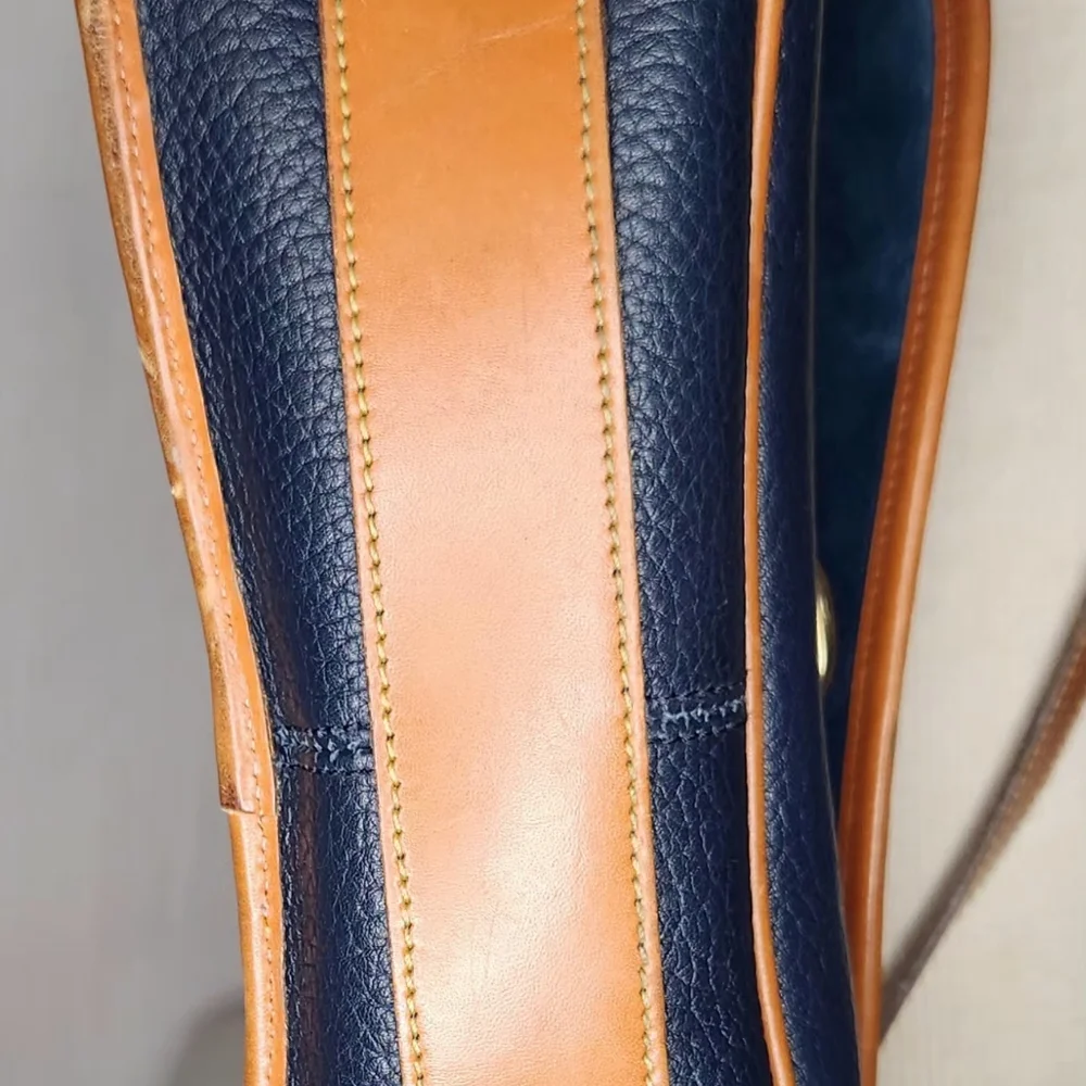Dooney & Bourke vintage equestrian all weather leather crossbody bag, navy